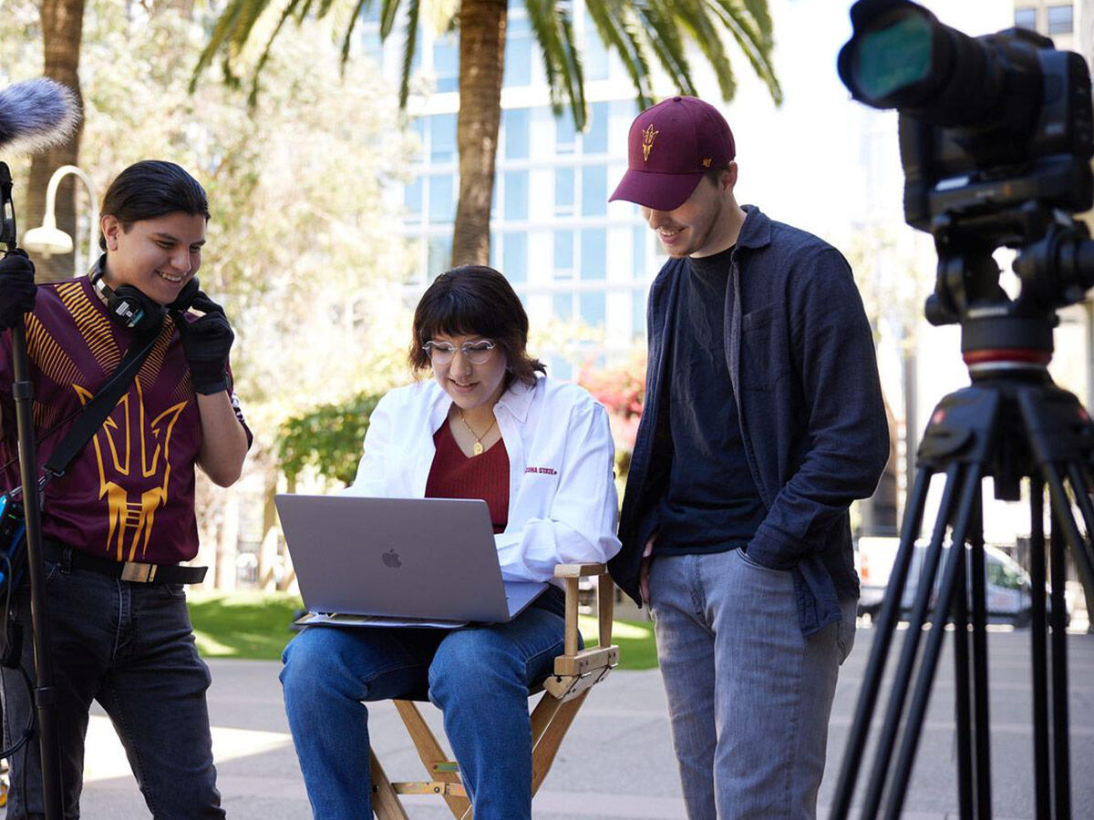 Students working together on a film set
