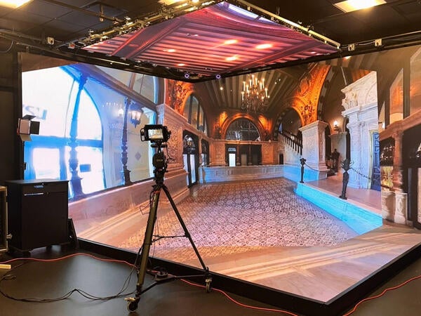 film set with a projection mapped background setup